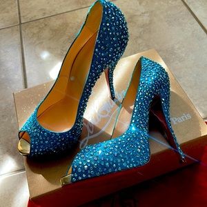 Christian Louboutin. Authentic, custom Swarovski.